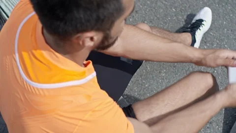 Disabled Runner Donning a Shrinker Sock Stock Footage 99768099