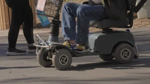 Disabled on scooter Stock Footage 268717666