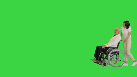 Disabled senior man and assistant walking by on a Green Screen, Chroma Key. Stock-Footage 149356203
