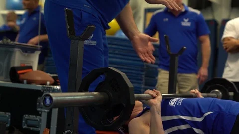 Disabled serviceman lifting weights in preparation for wounded warrior games Stock Footage 106561668