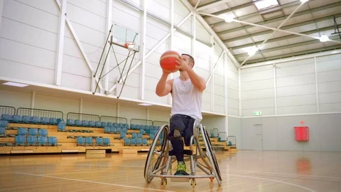 Disabled wheelchair Basketball player Taking A Shot From Front Video stock 120894553