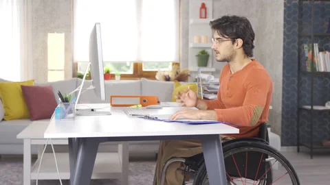 Disabled young man studying. Stock Footage 212886416