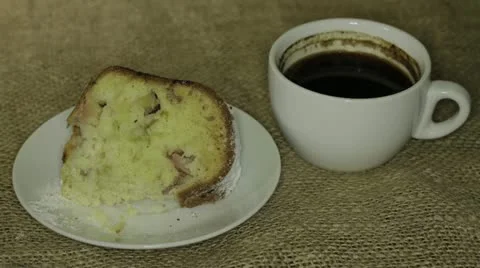 Disappearance of cake and coffee - time lapse  Stock Footage 12725085