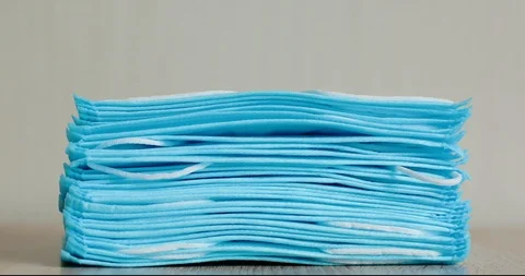 Disappearing stack of medical masks. Stop motion. Stock Footage 126606513