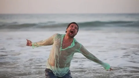 Disappointed depressed lost man screaming and falling into the water. Stock Footage 80446894