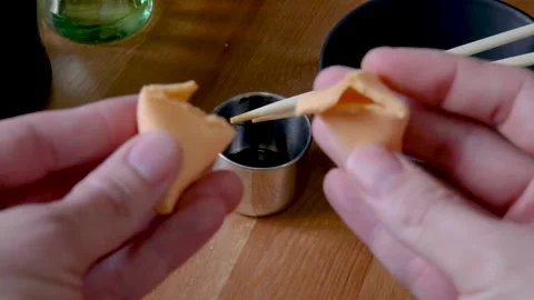 Disappointed by an Empty Fortune Cookie Stock Footage 133752161