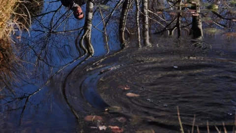 Disappointed Golfer Reflected Upside Down and Hitting the Golf Ball in the Water Stock Footage 267952096