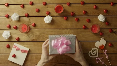 Disappointed manets empty box as holiday gift, top view Stock Footage 87975396