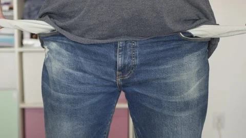 Disappointed Person Showing His Empty Pants Pockets. Unemployed Person with No Stock Footage 201028283