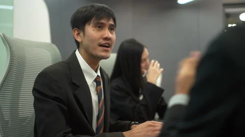 Disappointed stressed employee when talking with manager while meeting with dive Stock Footage 278215637