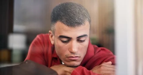 Disappointed, upset and man by window in home with ideas, mental health or .. Stock Photos
