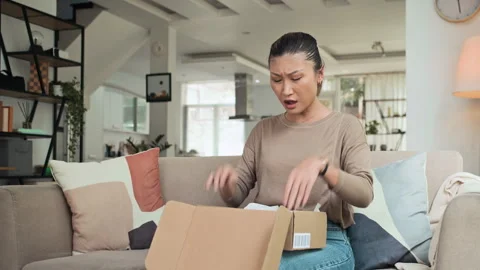 Disappointed Woman Getting Wrong Pair of Shoes in Parcel 動画素材 281712186