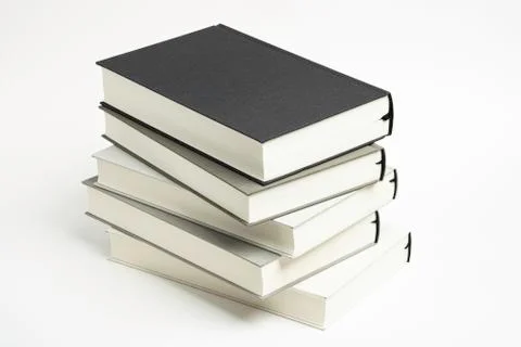 A Disarrayed Stack OF Cloth Bound Books Stock Photos