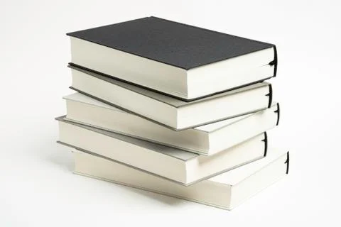 A Disarrayed Stack OF Cloth Bound Books Stock Photos