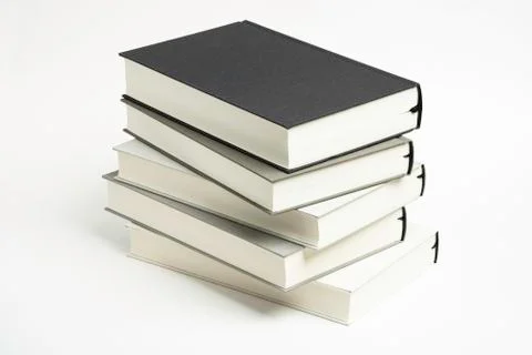 A Disarrayed Stack OF Cloth Bound Books Stock-Fotos