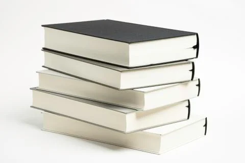 A Disarrayed Stack OF Cloth Bound Books Stock Photos