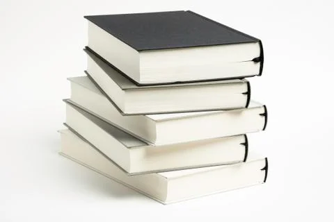 A Disarrayed Stack OF Cloth Bound Books Stock Photos