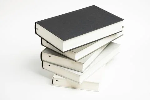 A Disarrayed Stack OF Cloth Bound Books Stock Photos