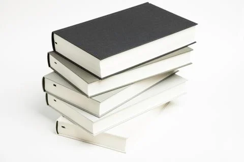 A Disarrayed Stack OF Cloth Bound Books Stock Photos