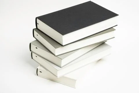 A Disarrayed Stack OF Cloth Bound Books Stock Photos