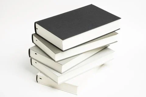 A Disarrayed Stack OF Cloth Bound Books Stock Photos