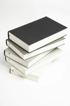A Disarrayed Stack OF Cloth Bound Books Stock Photos