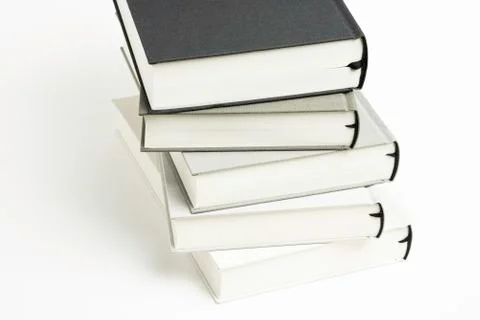 A Disarrayed Stack OF Cloth Bound Books Stock Photos