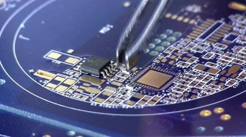 Disassemble circuit with surface mount IC's, resistors &amp; caps, by hand Stock Footage 10588955