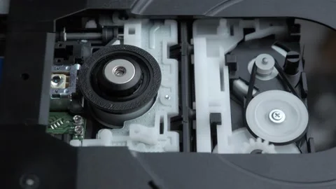 Disassembled broken PC dvd drive, checked for movement of the mechanism Stock Footage 131152506