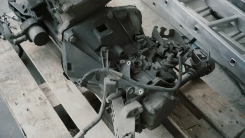 Disassembled car engine in garage Stock Footage 86352501