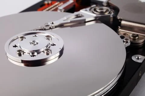 Disassembled computer hard drive with mirror disks Stock Photos