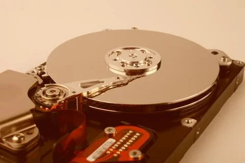 Disassembled computer hard drive with mirror disks on a white background, sof Stock Photos