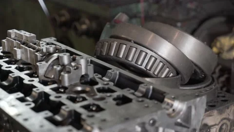 Disassembled cylinder head in the workshop Stock Footage 134255366