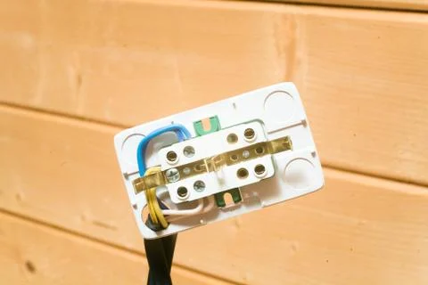 Disassembled double power socket with grounding close-up. Stock Photos