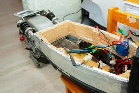 Disassembled electric scooter pulled out battery Stock Photos