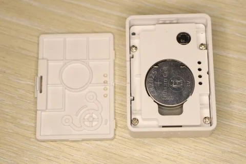 Disassembled Electronic Device Featuring a Battery Compartment for Enhanced Stock Photos