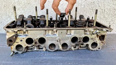 Disassembled Engine Cylinder Head During Automotive Repair Vídeo Stock 347188622