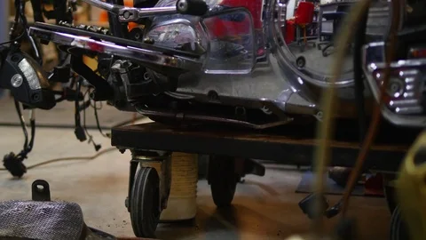 Disassembled engine of motorcycle in the garage Stock Footage