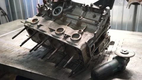 Disassembled the engine on the table Stock Footage 145660832