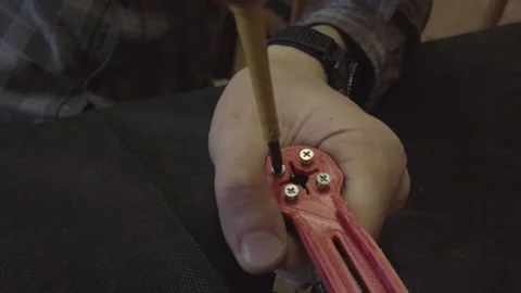 Disassembled FPV quadrocopter, do-it-yourself drone repair on a black table Stock Footage 168280485