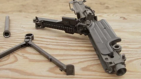 Disassembled gun on table  Video stock 76940323