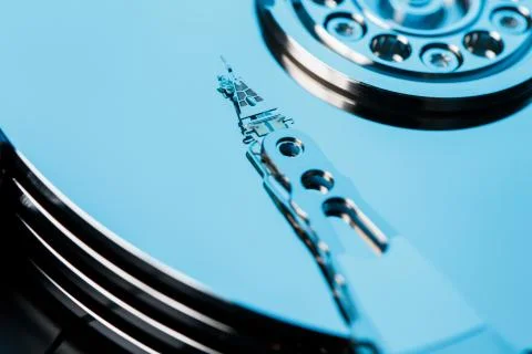 Disassembled hard drive from the computer, hdd with mirror effect. Opened har Stock Photos