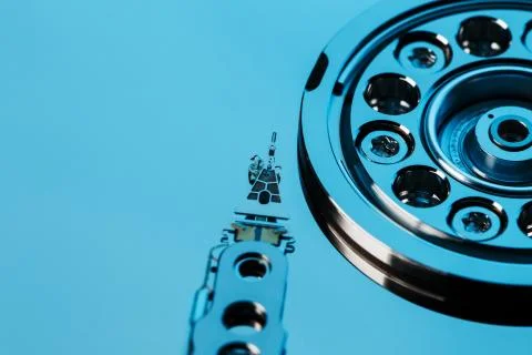 Disassembled hard drive from the computer, hdd with mirror effect. Opened har Stock Photos