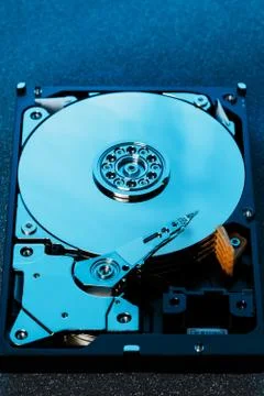 Disassembled hard drive from the computer, hdd with mirror effect Opened hard 스톡 사진