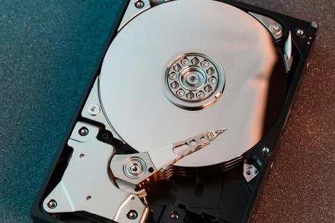 Disassembled hard drive from the computer, hdd with mirror effect. Opened har Fotos de archivo