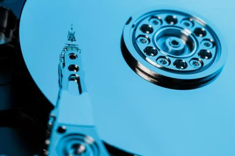 Disassembled hard drive from the computer, hdd with mirror effect. Opened har Stock Photos