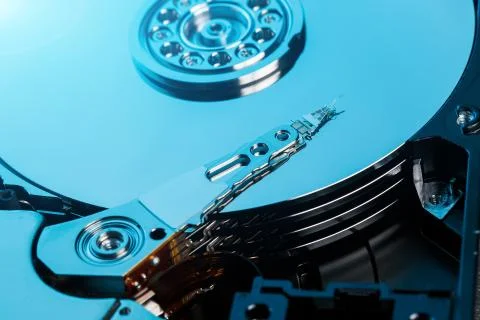 Disassembled hard drive from the computer, hdd with mirror effect. Opened har Stock Photos