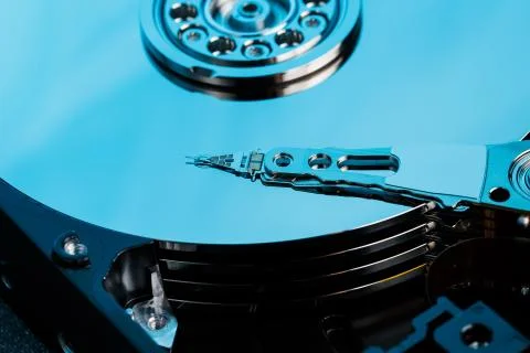 Disassembled hard drive from the computer, hdd with mirror effect. Opened har Stock Photos