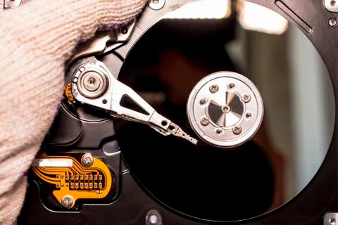 Disassembled hard drive from the computer, hdd with mirror effect. Stock-Fotos