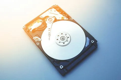 Disassembled hard drive from the computer hdd with mirror effects. Part of co Stock Photos